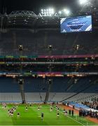 15 March 2025; Galway players during a minute's silence for former Galway footballer Billy Joyce, uncle of current Galway manager Pádraic Joyce, before the Allianz Football League Division 1 match between Dublin and Galway at Croke Park in Dublin. Photo by Piaras Ó Mídheach/Sportsfile
