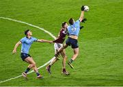 15 March 2025; Brian Howard of Dublin wins possession ahead of Matthew Tierney of Galway during the Allianz Football League Division 1 match between Dublin and Galway at Croke Park in Dublin. Photo by Piaras Ó Mídheach/Sportsfile