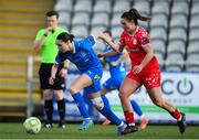 15 March 2025; Chloe Atkinson of Waterford in action against Jemma Quinn of Shelbourne during the SSE Airtricity Women's Premier Division match between Waterford and Shelbourne at the Regional Sports Centre in Waterford. Photo by Matt Browne/Sportsfile
