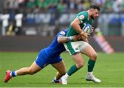 15 March 2025; Robbie Henshaw of Ireland is tackled by Tommaso Menoncello of Italy during the Guinness Six Nations Rugby Championship match between Italy and Ireland at the Stadio Olimpico in Rome, Italy. Photo by Ramsey Cardy/Sportsfile