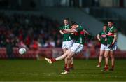 16 March 2025; Frank Irwin of Mayo kicks to miss a free during the Allianz Football League Division 1 match between Derry and Mayo at Celtic Park in Derry. Photo by Ben McShane/Sportsfile