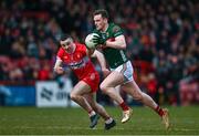 16 March 2025; Matthew Ruane of Mayo in action against Niall Toner of Derry during the Allianz Football League Division 1 match between Derry and Mayo at Celtic Park in Derry. Photo by Ben McShane/Sportsfile