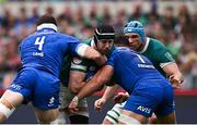 15 March 2025; Caelan Doris of Ireland is tackled by Dino Lamb, left, and Danilo Fischetti of Italy during the Guinness Six Nations Rugby Championship match between Italy and Ireland at the Stadio Olimpico in Rome, Italy. Photo by Seb Daly/Sportsfile