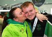 16 March 2025; Mairéad Sheehan celebrates with her son Joseph 'Joe-Joe' Sheehan of Team Ireland, a member of Mallow Special Olympics Club, Doneraile, Cork, who won Bronze in Floorball, on his arrival at Dublin airport after competing in the Turin 2025 Special Olympics World Winter Games in Italy. Photo by Ray McManus/Sportsfile