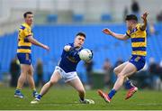 16 March 2025; Óisin Kiernan of Cavan in action against Niall Higgins of Roscommon during the Allianz Football League Division 2 match between Roscommon and Cavan at King & Moffatt Dr Hyde Park in Roscommon. Photo by Tom Beary/Sportsfile