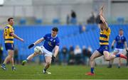 16 March 2025; Óisin Kiernan of Cavan in action against Niall Higgins of Roscommon during the Allianz Football League Division 2 match between Roscommon and Cavan at King & Moffatt Dr Hyde Park in Roscommon. Photo by Tom Beary/Sportsfile