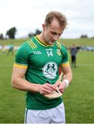 16 March 2025; Shane Walsh of Meath signs a supporters hurley after the Allianz Football League Division 2 match between Meath and Monaghan at Páirc Tailteann in Navan, Meath. Photo by Thomas Flinkow/Sportsfile