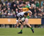 16 March 2025; Tyrone goalkeeper Niall Morgan in action against Jamie Brennan of Donegal during the Allianz Football League Division 1 match between Donegal and Tyrone at O’Donnell Park in Letterkenny, Donegal. Photo by Piaras Ó Mídheach/Sportsfile