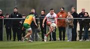 16 March 2025; Darragh Canavan of Tyrone in action against Peadar Mogan of Donegal during the Allianz Football League Division 1 match between Donegal and Tyrone at O’Donnell Park in Letterkenny, Donegal. Photo by Piaras Ó Mídheach/Sportsfile