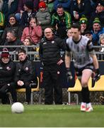 16 March 2025; Tyrone manager Malachy O'Rourke watches as his goalkeeper Niall Morgan takes a free during the Allianz Football League Division 1 match between Donegal and Tyrone at O’Donnell Park in Letterkenny, Donegal. Photo by Piaras Ó Mídheach/Sportsfile