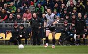 16 March 2025; Tyrone manager Malachy O'Rourke watches as his goalkeeper Niall Morgan takes a free during the Allianz Football League Division 1 match between Donegal and Tyrone at O’Donnell Park in Letterkenny, Donegal. Photo by Piaras Ó Mídheach/Sportsfile