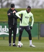17 March 2025; Sinclair Armstrong and assistant head coach John O'Shea, left, during a Republic of Ireland training session at the FAI National Training Centre in Abbotstown, Dublin. Photo by Stephen McCarthy/Sportsfile