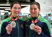17 March 2025; Aoife, right, and Lisa O’Rourke of Ireland with the silver medals they won in their respective Elite Women 70-75kg middleweight and 66-70kg light middleweight final bouts at the 2025 IBA Women's World Boxing Championships finals upon their arrival at Dublin Airport from the IBA Women's World Boxing Championships in Niš, Serbia. Photo by Ray McManus/Sportsfile