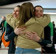 17 March 2025; Aoife, left, and Lisa O’Rourke of Ireland with the silver medals they won in their respective Elite Women 70-75kg middleweight and 66-70kg light middleweight final bouts at the 2025 IBA Women's World Boxing Championships finals are congratulated by their mother Ann upon their arrival at Dublin Airport from the IBA Women's World Boxing Championships in Niš, Serbia. Photo by Ray McManus/Sportsfile