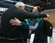 17 March 2025; Lisa O’Rourke of Ireland with the silver medal she won at the 2025 IBA Women's World Boxing Championships finals is congratulated by her dad Kevin upon their arrival at Dublin Airport from the IBA Women's World Boxing Championships in Niš, Serbia. Photo by Ray McManus/Sportsfile