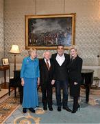 15 March 2025; President of Ireland Michael D Higgins and wife Sabina with Bernie Slaven and wife Claire of the Republic of Ireland squad from the Italia 1990 FIFA World Cup at Áras an Uachtaráin in Dublin. Photo by Stephen McCarthy/Sportsfile