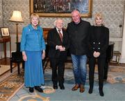 15 March 2025; President of Ireland Michael D Higgins and wife Sabina with Frank Stapleton and wife Christine of the Republic of Ireland squad from the Italia 1990 FIFA World Cup at Áras an Uachtaráin in Dublin. Photo by Stephen McCarthy/Sportsfile