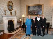 15 March 2025; President of Ireland Michael D Higgins and wife Sabina with Bernie Slaven and wife Claire of the Republic of Ireland squad from the Italia 1990 FIFA World Cup at Áras an Uachtaráin in Dublin. Photo by Stephen McCarthy/Sportsfile
