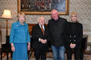 15 March 2025; President of Ireland Michael D Higgins and wife Sabina with Frank Stapleton and wife Christine of the Republic of Ireland squad from the Italia 1990 FIFA World Cup at Áras an Uachtaráin in Dublin. Photo by Stephen McCarthy/Sportsfile