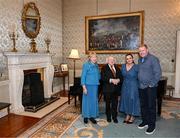 15 March 2025; President of Ireland Michael D Higgins and wife Sabina with Steve Staunton and wife Lynda of the Republic of Ireland squad from the Italia 1990 FIFA World Cup at Áras an Uachtaráin in Dublin. Photo by Stephen McCarthy/Sportsfile
