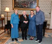 15 March 2025; President of Ireland Michael D Higgins and wife Sabina with Steve Staunton and wife Lynda of the Republic of Ireland squad from the Italia 1990 FIFA World Cup at Áras an Uachtaráin in Dublin. Photo by Stephen McCarthy/Sportsfile