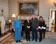 15 March 2025; President of Ireland Michael D Higgins and wife Sabina with Kevin Sheedy and wife Jo of the Republic of Ireland squad from the Italia 1990 FIFA World Cup at Áras an Uachtaráin in Dublin. Photo by Stephen McCarthy/Sportsfile