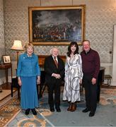 15 March 2025; President of Ireland Michael D Higgins and wife Sabina with Ronnie Whelan and wife Elaine of the Republic of Ireland squad from the Italia 1990 FIFA World Cup at Áras an Uachtaráin in Dublin. Photo by Stephen McCarthy/Sportsfile