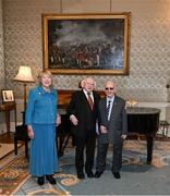 15 March 2025; President of Ireland Michael D Higgins and wife Sabina with kitman Charlie O’Leary of the Republic of Ireland squad from the Italia 1990 FIFA World Cup at Áras an Uachtaráin in Dublin. Photo by Stephen McCarthy/Sportsfile