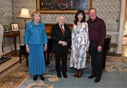 15 March 2025; President of Ireland Michael D Higgins and wife Sabina with Ronnie Whelan and wife Elaine of the Republic of Ireland squad from the Italia 1990 FIFA World Cup at Áras an Uachtaráin in Dublin. Photo by Stephen McCarthy/Sportsfile