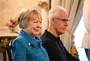 15 March 2025; Sabina Higgins, wife of the President of Ireland Michael D Higgins, and Mick McCarthy of the Republic of Ireland squad from the Italia 1990 FIFA World Cup during a visit to Áras an Uachtaráin in Dublin, hosted by President of Ireland Michael D Higgins. Photo by Stephen McCarthy/Sportsfile