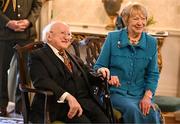 15 March 2025; President of Ireland Michael D Higgins and wife Sabina during a reception hosted for the Republic of Ireland squad from the Italia 1990 FIFA World Cup at Áras an Uachtaráin in Dublin. Photo by Stephen McCarthy/Sportsfile