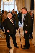 15 March 2025; President of Ireland Michael D Higgins speaking with Irish Times journalist Emmet Malone during a reception for the Republic of Ireland squad from the Italia 1990 FIFA World Cup at Áras an Uachtaráin in Dublin. Photo by Stephen McCarthy/Sportsfile
