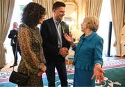15 March 2025; Sabina Higgins with Niall Quinn, and his wife Gillian, of the Republic of Ireland squad from the Italia 1990 FIFA World Cup at during a reception hosted by President of Ireland Michael D Higgins at Áras an Uachtaráin in Dublin. Photo by Stephen McCarthy/Sportsfile