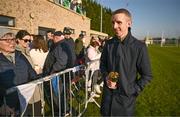 18 March 2025; Jockey Mark Walsh is greeted by supporters during homecoming celebrations for Cheltenham Gold Cup winner Inothewayurthinkin at Skryne Gaelic Football Club in Tara, Meath. Photo by Ben McShane/Sportsfile