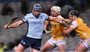 25 January 2025; John Hetherton of Dublin in action against Paddy Burke and Declan McCloskey, right, of Antrim during the Allianz Hurling League Division 1B match between Dublin and Antrim at Croke Park in Dublin. Photo by Stephen McCarthy/Sportsfile