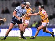 25 January 2025; John Hetherton of Dublin in action against Paddy Burke and Declan McCloskey, right, of Antrim during the Allianz Hurling League Division 1B match between Dublin and Antrim at Croke Park in Dublin. Photo by Stephen McCarthy/Sportsfile