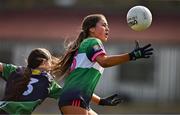 19 March 2025; Emma Horgan of Scoil Mhuire agus Íde evades the tackle of Aoife Rogers of Bailieborough CS during the Lidl LGFA PPS All-Ireland Junior C final match between Bailieborough CS of Cavan and Scoil Mhuire agus Íde of Limerick at Duggan Park in Ballinasloe, Galway. Photo by Ben McShane/Sportsfile
