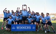 19 March 2025; St Michael's College captain Herbie Boyle lifts the cup with team-mates after their side's victory in the Bank of Ireland Leinster Rugby Boys Schools Junior Cup final match between St Michael’s College and St Vincent's Castleknock College at Energia Park in Dublin. Photo by Shauna Clinton/Sportsfile