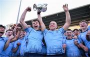 19 March 2025; St Michael's College captain Herbie Boyle lifts the cup with team-mates after their side's victory in the Bank of Ireland Leinster Rugby Boys Schools Junior Cup final match between St Michael’s College and St Vincent's Castleknock College at Energia Park in Dublin. Photo by Shauna Clinton/Sportsfile
