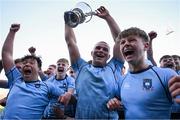 19 March 2025; St Michael's College captain Herbie Boyle, centre, and team-mates celebrate after their side's victory in the Bank of Ireland Leinster Rugby Boys Schools Junior Cup final match between St Michael’s College and St Vincent's Castleknock College at Energia Park in Dublin. Photo by Shauna Clinton/Sportsfile