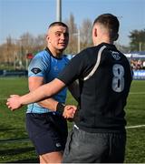 19 March 2025; St Michael's College captain Herbie Boyle shakes hands with St Vincent's Castleknock College captain Matthew Lynch after his side's victory in the Bank of Ireland Leinster Rugby Boys Schools Junior Cup final match between St Michael’s College and St Vincent's Castleknock College at Energia Park in Dublin. Photo by Shauna Clinton/Sportsfile