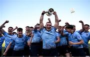 19 March 2025; St Michael's College captain Herbie Boyle, centre, and team-mates celebrate after their side's victory in the Bank of Ireland Leinster Rugby Boys Schools Junior Cup final match between St Michael’s College and St Vincent's Castleknock College at Energia Park in Dublin. Photo by Shauna Clinton/Sportsfile