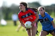 20 March 2025; Rachel Murphy  of St Mary's Macroom in action against Aimee Devlin of St Patrick's Academy during the Lidl LGFA PPS All-Ireland Junior B final match between St Mary’s Macroom of Cork and St Patrick’s Academy of Dungannon of Tyrone at Manguard Park in Kildare. Photo by Piaras Ó Mídheach/Sportsfile