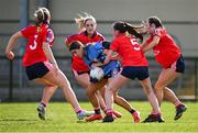 20 March 2025; Aine Nelis of St Patrick's Academy in action against St Mary's Macroom players, from left, Clodagh Murray, Hayleigh O'Shea, Ruby Prendaville and Siun Cronin during the Lidl LGFA PPS All-Ireland Junior B final match between St Mary’s Macroom of Cork and St Patrick’s Academy of Dungannon of Tyrone at Manguard Park in Kildare. Photo by Piaras Ó Mídheach/Sportsfile