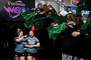 21 March 2025; Neve Jones, left, and Sadhbh McGrath during the Ireland rugby captain's run at Kingspan Stadium in Belfast. Photo by Ramsey Cardy/Sportsfile