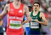 21 March 2025; Andrew Coscoran of Ireland crosses the line to finish third during the men's 1500m heats on day one of the World Indoor Athletics Championships at Nanjing's Cube Gymnasium at the Nanjing Youth Olympic Sports Park in Nanjing, China. Photo by Sportsfile