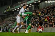 21 March 2025; Trai Hume of Northern Ireland in action against Ruben Vargas of Switzerland during the international friendly match between Northern Ireland and Switzerland at the National Football Stadium at Windsor Park in Belfast. Photo by Ben McShane/Sportsfile