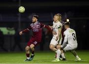 21 March 2025; Dale Holland of Cobh Ramblers in action against Aaron Connolly of Athlone Town during the SSE Airtricity Men's First Division match between Cobh Ramblers and Athlone Town at St Colman's Park in Cobh, Cork. Photo by Michael P Ryan/Sportsfile