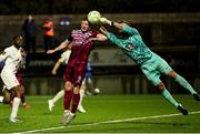 21 March 2025; Athlone Town goalkeeper Matthew Connor makes a save underpressure from Cian Murphy of Cobh Ramblers during the SSE Airtricity Men's First Division match between Cobh Ramblers and Athlone Town at St Colman's Park in Cobh, Cork. Photo by Michael P Ryan/Sportsfile