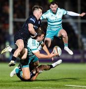 21 March 2025; Tom Farrell of Munster offloads during the United Rugby Championship match between Glasgow Warriors and Munster at Scotstoun Stadium in Glasgow, Scotland. Photo by Ewan Boothman/Sportsfile
